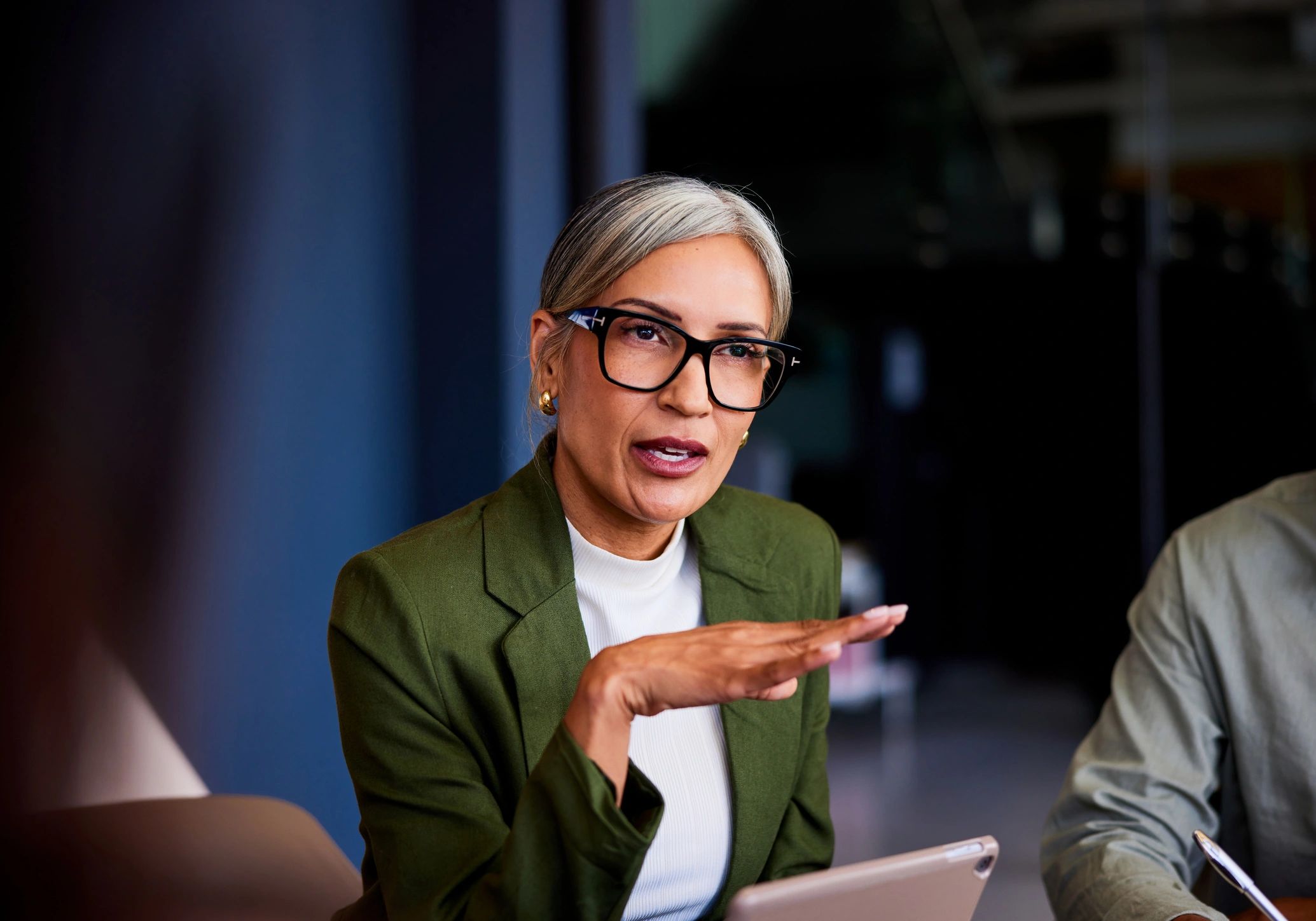 Professional in meeting representing executive stakeholder