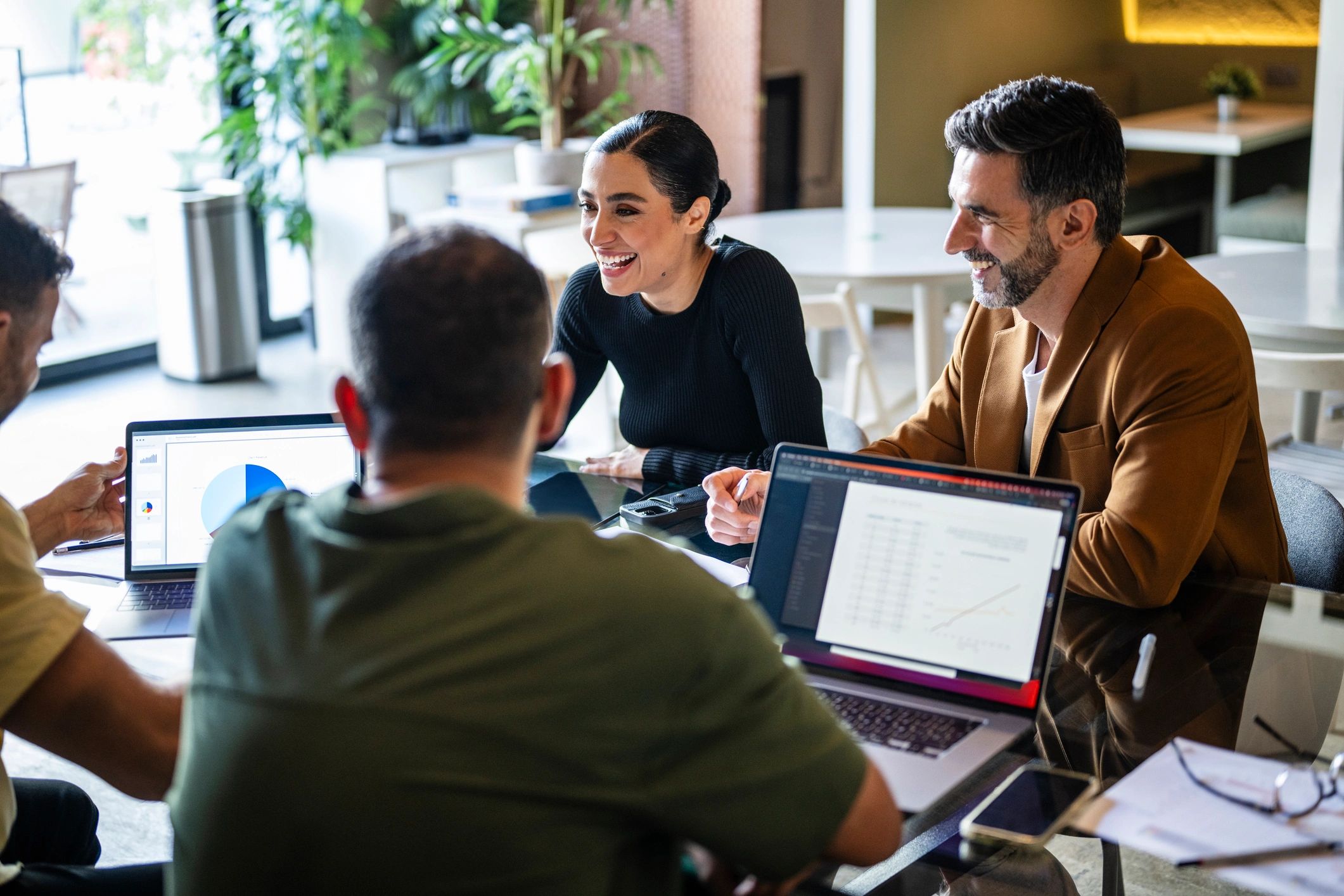 Business team in meeting representing client collaboration