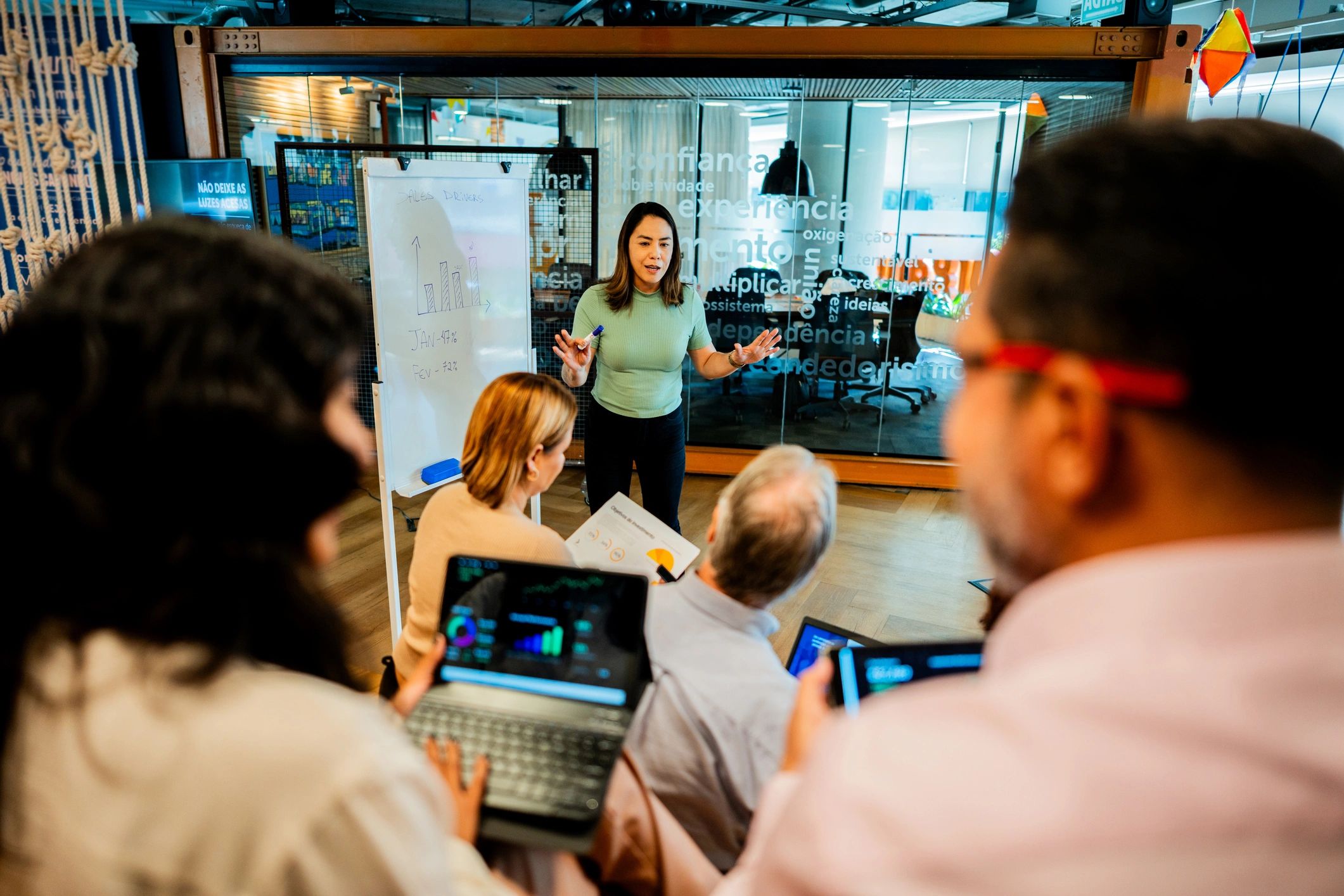 Instructor presenting AI training to a team